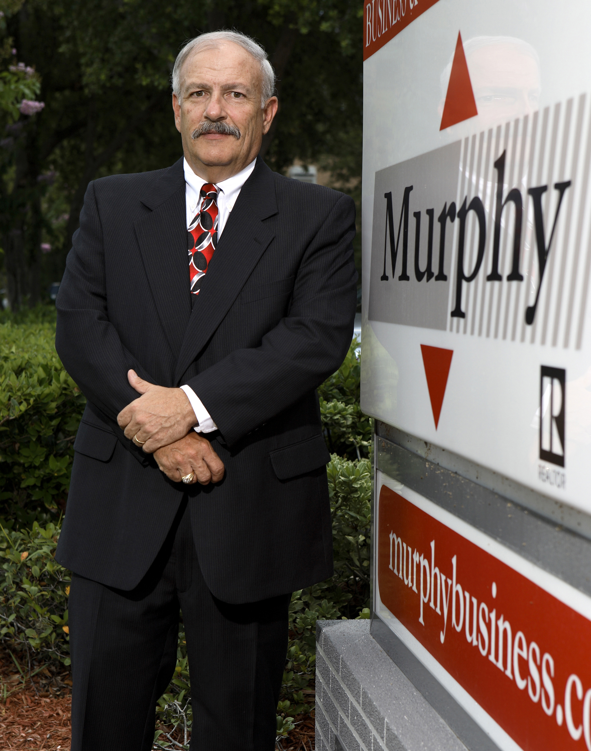 Portrait of Roger Murphy, late founder of Murphy Business Sales, National Business Brokerage Firm